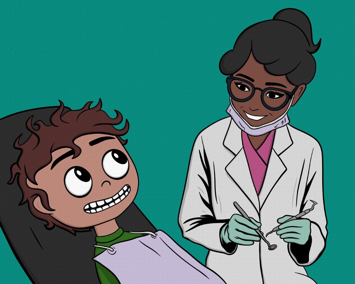 A friendly dentist checks the boy's teeth.