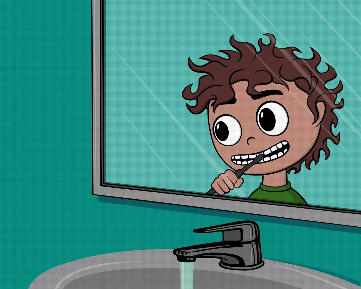 The boy brushing his teeth at the bathroom mirror.